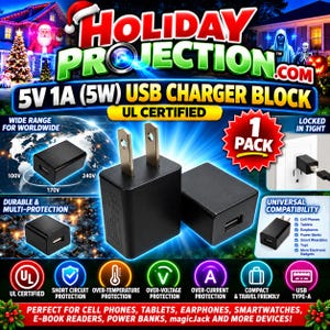 May include: A black 5V 1A 5W USB charger block with a standard two-prong plug. The product is UL certified and features a compact design for universal compatibility with cell phones, tablets, and other electronic devices. The text reads Holiday Projection.com, 5V 1A 5W USB Charger Block, UL Certified, 1 Pack, and Universal Compatibility.