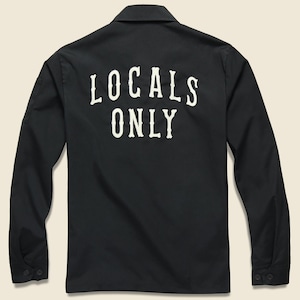 May include: Black long-sleeved work shirt with a white embroidered "Locals Only" text on the back.