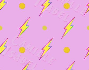 May include: A pink background with a repeating pattern of yellow circles, rainbow lightning bolts, and the text "Camille Isabel" in white with a pink outline.
