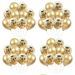 May include: A set of gold balloons with black numbers and confetti. The balloons are decorated with the numbers 30, 40, and 50, as well as the words "Happy Birthday".