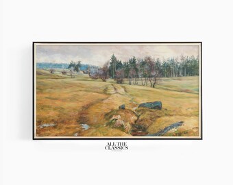 May include: A framed oil painting depicting a landscape scene with a dirt path leading through a field towards a forest in the distance. The field is covered in dry grass and there are a few trees scattered throughout the scene. The sky is overcast and the overall tone of the painting is muted.