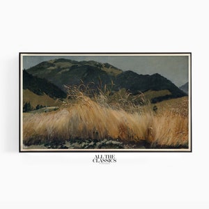 Puede incluir: Una pintura enmarcada de un paisaje con un campo de hierba alta en primer plano y una cordillera en el fondo. El cielo es de color gris claro y las montañas son de color verde oscuro. La hierba es de color marrón claro.