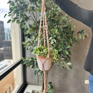 Pearl Sun Catcher Macrame Plant Hanger, Macrame planter with sun-catching beads, Modern boho plant decor, Large plant pot holder with tassel