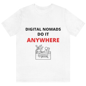 May include: White t-shirt with black text that reads "DIGITAL NOMADS DO IT ANYWHERE". A black and white illustration of a person sitting in a beach chair with a laptop, palm tree, and sand.