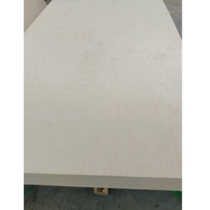 May include: A sheet of light-coloured plywood with a smooth surface and a subtle wood grain pattern.