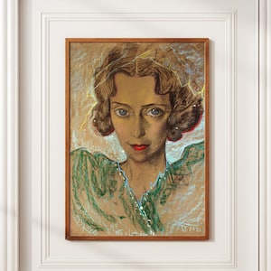 May include: A framed portrait painting of a person with wavy brown hair, large eyes, and red lips. The subject wears a textured green garment with a V-neckline. The background features golden, swirling brushstrokes around the head.