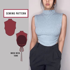 May include: A sewing pattern for a mock neck tank top with a tie at the back. The pattern is illustrated in red on a gray background. The text "SEWING PATTERN" and "MOCK NECK TANK" are included in the image.