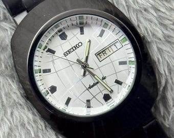 Vintage Seiko 5 automatisch polshorloge, zwarte kast, dag/datum