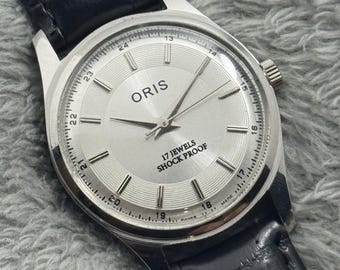 希少なヴィンテージ ORIS レッドダイヤル 機械式手巻き FHF