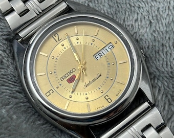 Montre automatique Seiko 5 vintage, cadran doré, jour/date, fabrication japonaise