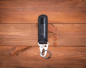 Handmade leather keychain with tactical HK Clip in Black Pueblo italian leather and Black Tweed lining. The Baileyi.