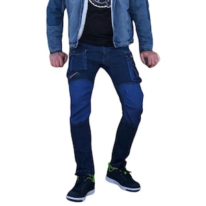 May include: Blue denim jeans with multiple pockets and reinforced knees. The jeans have a relaxed fit and are made of a durable material.
