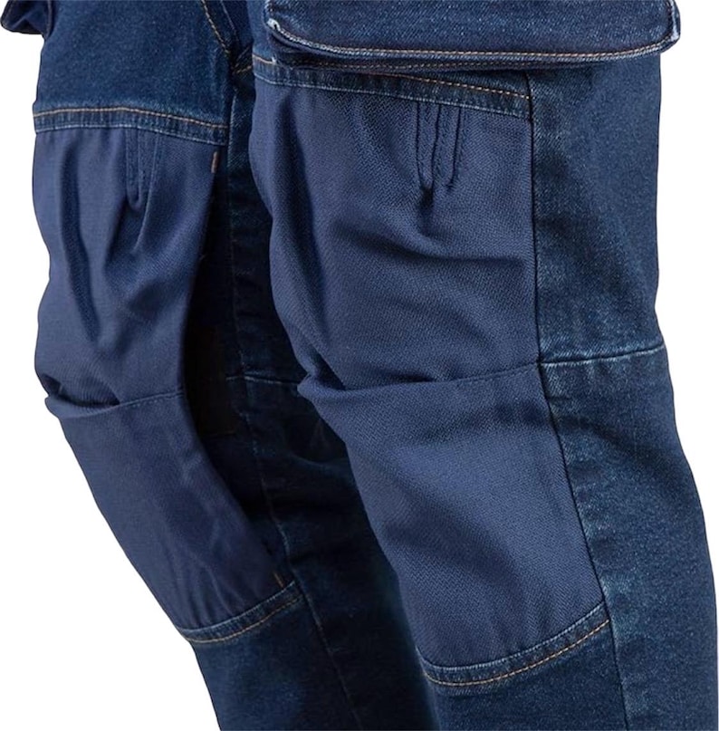 May include: A pair of blue denim pants with reinforced knee pads. The pants have multiple pockets, including cargo pockets on the sides.