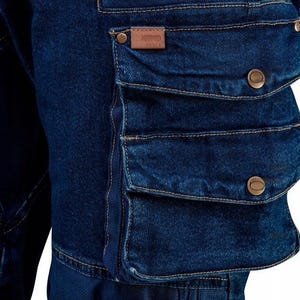 May include: Dark blue denim cargo pants with multiple pockets and brown button accents.