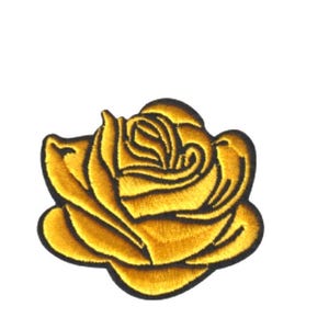 May include: Embroidered patch featuring a golden yellow rose with black outlining. The rose is a detailed floral design, perfect for adding to clothing or accessories. The patch is on a white background.
