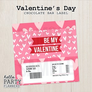 May include: Pink and white chocolate bar wrapper with a heart pattern. The wrapper says "Be My Valentine" in red letters. The wrapper also includes a nutrition facts label with a serving size of "Be Mine".