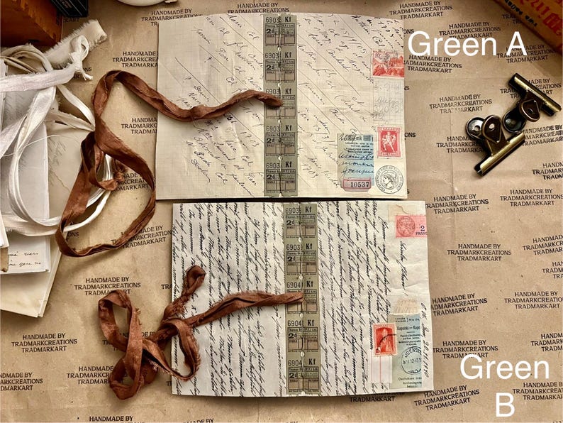 May include: Two pieces of vintage paper with handwritten text and stamps. The paper is brown and has a worn look. There is a brown ribbon on top of the paper. The paper is labeled "Green A" and "Green B".