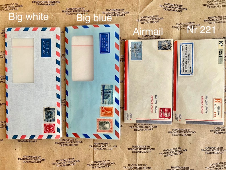 May include: Three vintage airmail envelopes with red, white, and blue borders. The envelopes are labeled "Big white", "Big blue", and "Airmail Nr 221".