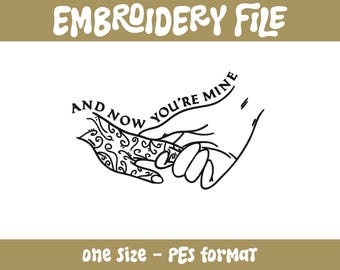 May include: Black and white line art embroidery design of two hands holding each other with the text "And Now You're Mine" written on the fingers.