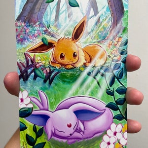 May include: A watercolor painting of two Eevee evolutions, a brown and tan Espeon and a purple Umbreon, in a forest setting. The Espeon is sitting up and looking at the viewer, while the Umbreon is sleeping. The background is a lush green forest with flowers and trees.