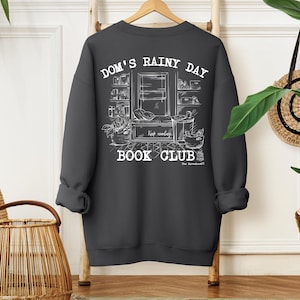 Sudadera Ravenhood del club de lectura de los días lluviosos de Dom CON LICENCIA