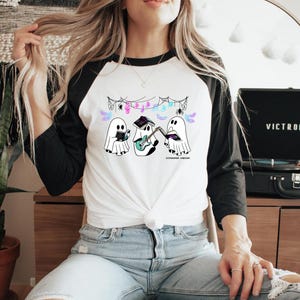 LICENSED Ghosts Reading The Bittersweet Symphony Series Raglan Baseball Tee