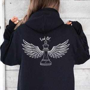 May include: Black hoodie with a white graphic of a chess king with wings and the text "End Of."