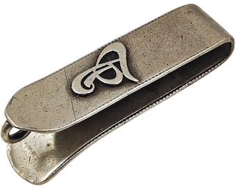 Vintage money clip with engravings