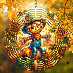 May include: A colorful, layered autumn-themed decoration featuring a smiling scarecrow in overalls and a hat, sitting on a pumpkin. The design includes sunflowers, pumpkins, and wheat, with a background of fall foliage.