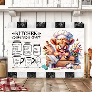 May include: Kitchen conversion chart featuring a cartoon cow chef. The chart displays measurements in pints, cups, and litres. The design includes a black and white checkered border and a charming illustration of a cow.