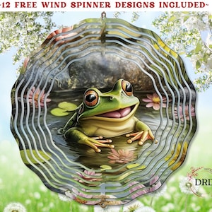 May include: A metal wind spinner with a green frog design. The frog is sitting in a pond with lily pads and flowers. The wind spinner has multiple layers and is designed to spin in the wind.