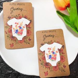 Kundenspezifische Babyparty-Gefälligkeiten, Geburtsankündigung-Idee, Party-Dekor, Baby in der Blüte Wildblumen-Samenpapier Strampelanzug, danke Papierkarte