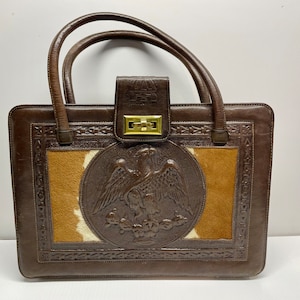 Cartera vintage de piel de vaca y cuero hecha a mano en México