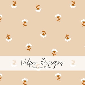 Peut inclure: Un motif répétitif composé de petites fleurs blanches avec des tiges et des cœurs marron dispersés sur un fond beige clair. Une bande horizontale blanche au centre affiche le texte noir Volpe Designs Seamless Pattern.
