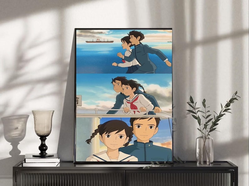 May include: Framed anime art print featuring three panels of a couple in a seaside setting. The artwork depicts a boy and girl in various poses, with a ship in the background and a blue sky.
