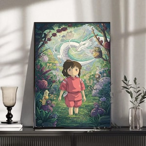 May include: Framed art print featuring a young girl in a pink outfit standing in a lush, colorful forest. A white dragon and other fantastical creatures are visible in the background. The artwork has a whimsical, animated style.