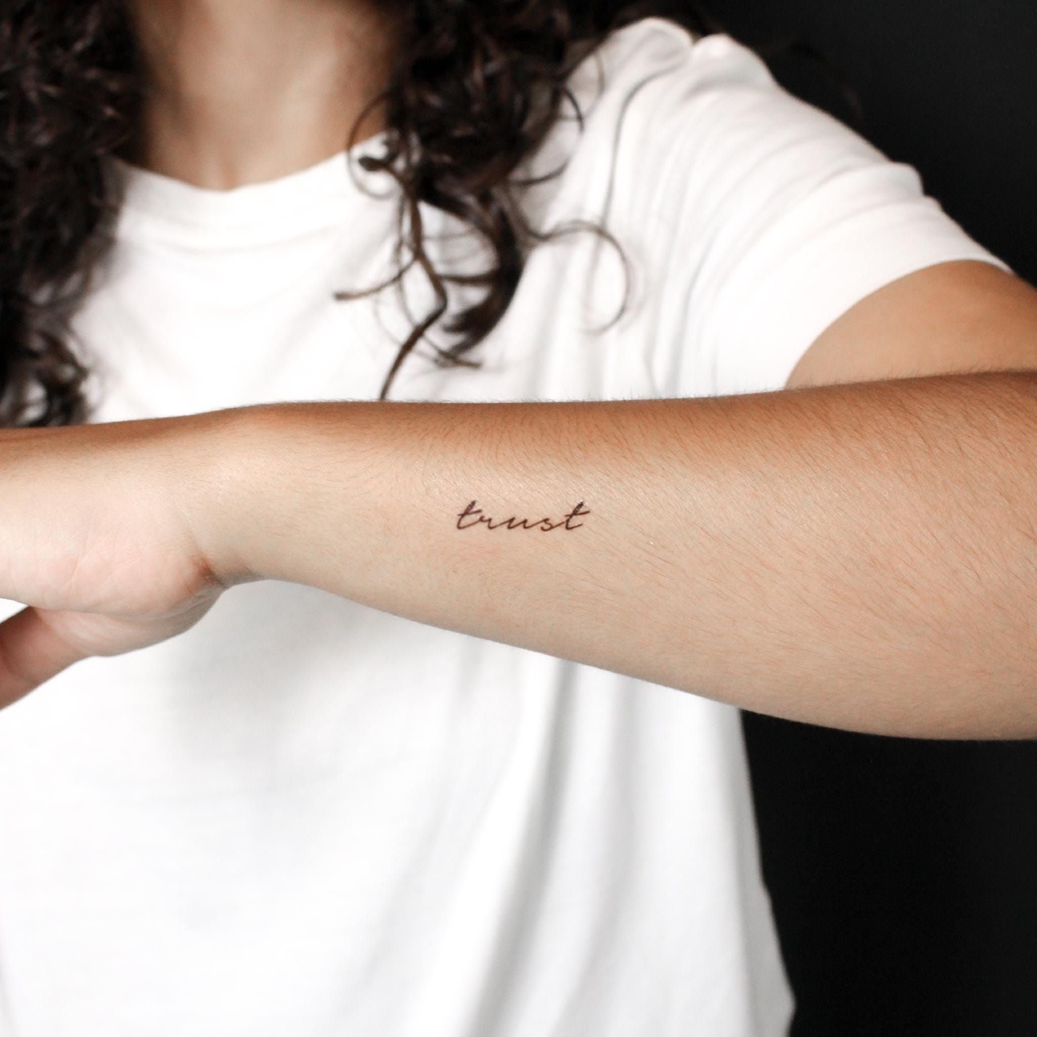 Female Trust No One Tattoo Meaning