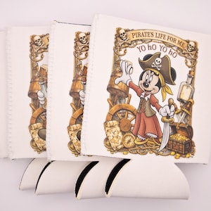 May include: White can coolers with a pirate theme. Each cooler features a cartoon pirate character with the text "Pirate's Life for Me" and "Yo ho Yo ho". The design includes a treasure chest, compass, and ship's wheel.