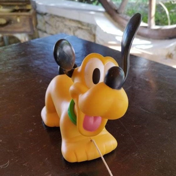 Vintage Walt Disney Pluto/chien grincement/Rolling Pull Toy/jouet à tirer/plastique jaune/mouvements tête quand déplacements/jeu pour enfant