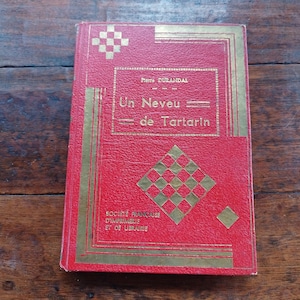 Libro de segunda mano, tapa dura roja, letras doradas/cuento infantil P. Durandal "Un sobrino de Tartarín/125 páginas, 19 grabados/libro de bibliófilo