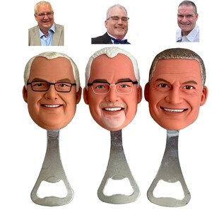 May include: Three personalized bottle openers with faces of people on them. The bottle openers are silver metal.