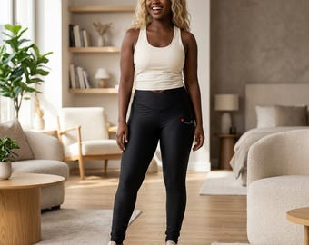 Rode legging met ballonkunst | Zwarte yogalegging met hoge taille
