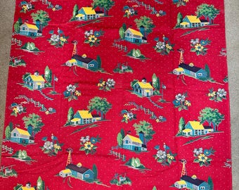 May include: A red fabric featuring a repeating pattern of farmhouses with yellow roofs, blue siding, green trees, and white flowers. The background is decorated with small white dots, and the design includes fences and windmills throughout the print.