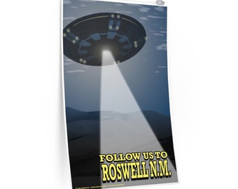 May include: A poster featuring a black and white illustration of a UFO with a beam of light shining down on a desert landscape. The text "FOLLOW US TO ROSWELL N.M." is in yellow letters.