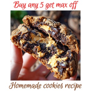 May include: Close-up of a chocolate chip cookie filled with peanut butter. The cookie is broken in half, revealing the peanut butter filling. The text "Buy any 5 get max off" is at the top of the image and "Homemade cookies recipe" is at the bottom.
