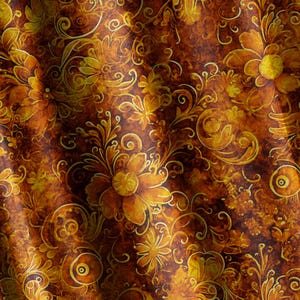 May include: A brown fabric with a gold floral pattern. The fabric has a textured, almost watercolor-like appearance.