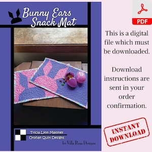 May include: A digital download pattern for a quilted bunny ear snack mat. The mat is purple and pink with a white and pink checkered border. The pattern is by Tricia Lynn Maloney for Orphan Quilt Designs.