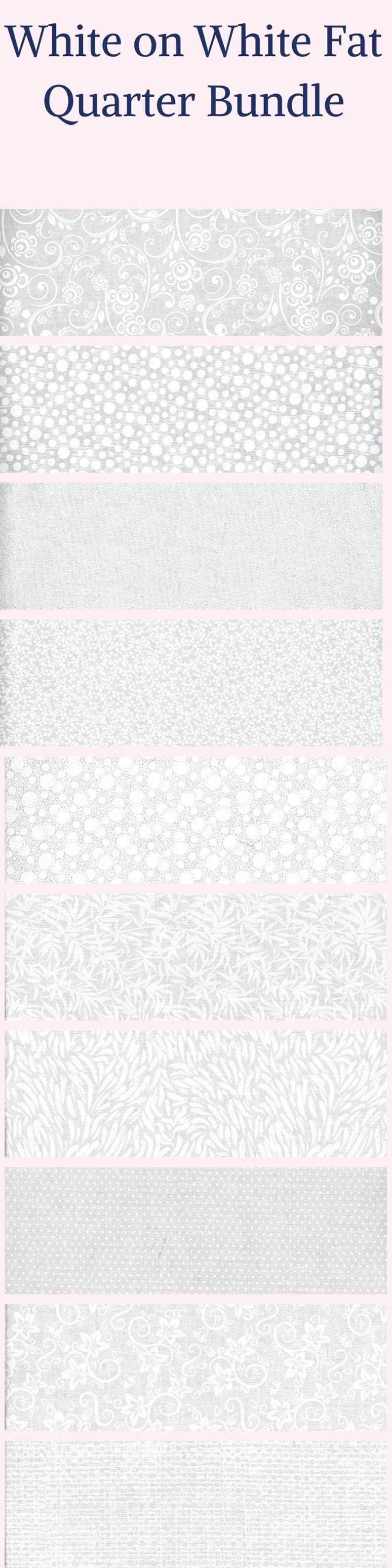 May include: A White on White Fat Quarter Bundle featuring ten stacked fabric swatches. Each piece of fabric is white with subtle white patterns including floral swirls, polka dots, small blossoms, leaves, and geometric textures. The text reads White on White Fat Quarter Bundle.