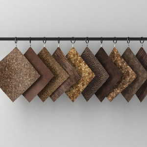 May include: A collection of ten square fabric swatches in various shades of brown, tan, and gold, featuring diverse textures and patterns. Each swatch is suspended from a black metal rod by a small silver clip, arranged in a horizontal row.