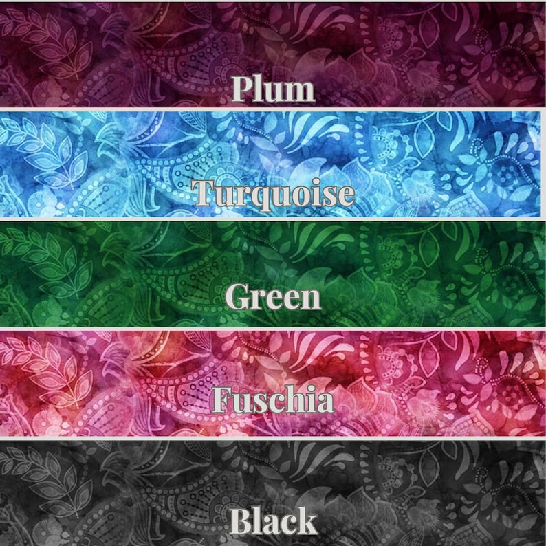 May include: Five fabric swatches with a paisley pattern. The swatches are in the colors plum, turquoise, green, fuchsia, and black.